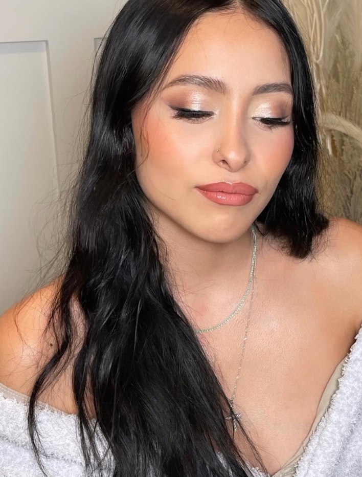 Occasion makeup with softly defined eyes and a warm lip